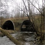 Tunel pod silnicí č. 7  6.3.2022, stav 31cm (0,95m3/s) v Postoloprtech